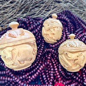 hand carved wooded jars